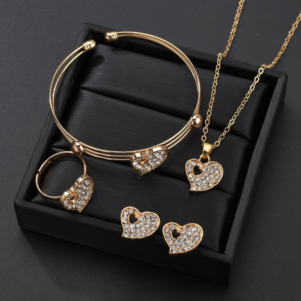 Set de bisutería dorado de corazones: collar, pendientes, anillo y pulsera